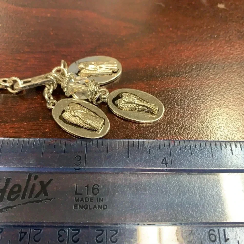 Avon trinity of angels key chain silver tone 4 inches long